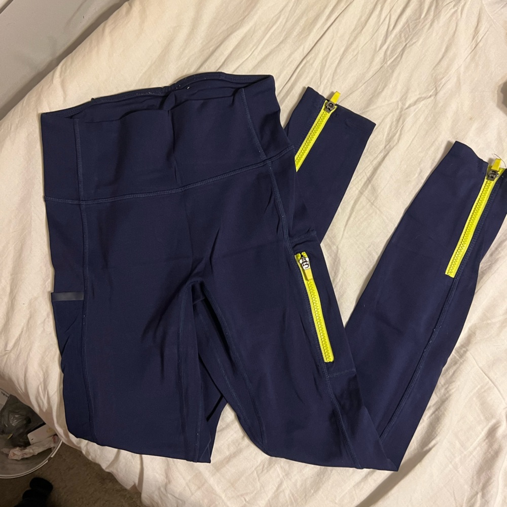Fabletics Blue and Yellow Leggings with Bold Stripes